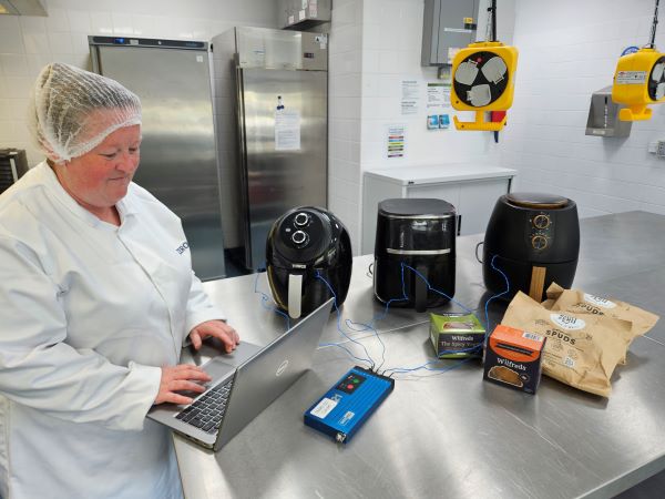 Technologist with air fryers