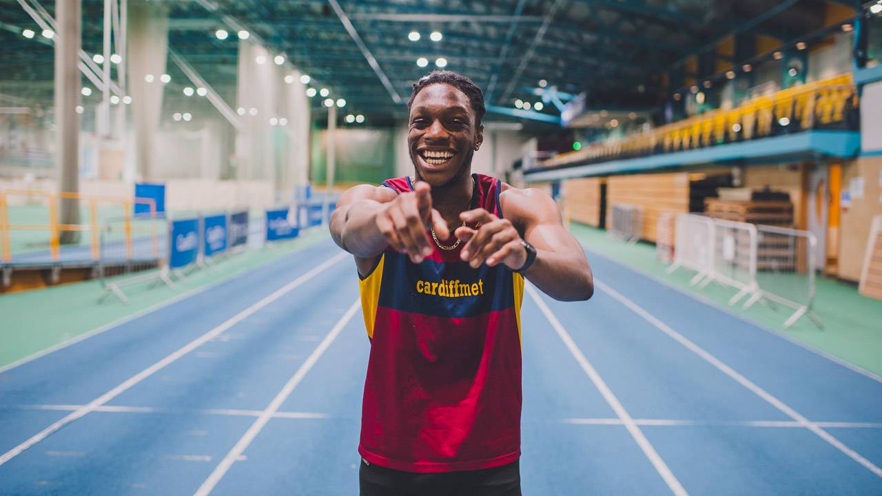 Student on indoor athletics track