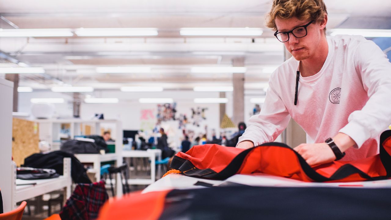 Student working with fabric